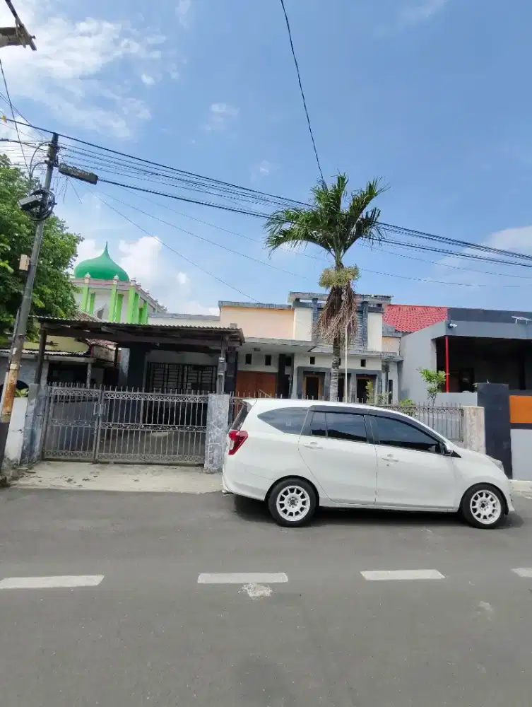 RUMAH TENGAH KOTA