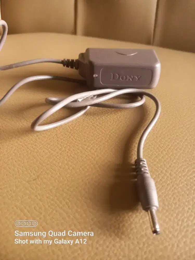 Alat Charger Senter Kepala Dony original,Fungsi Normal. 4,2V # 700mA