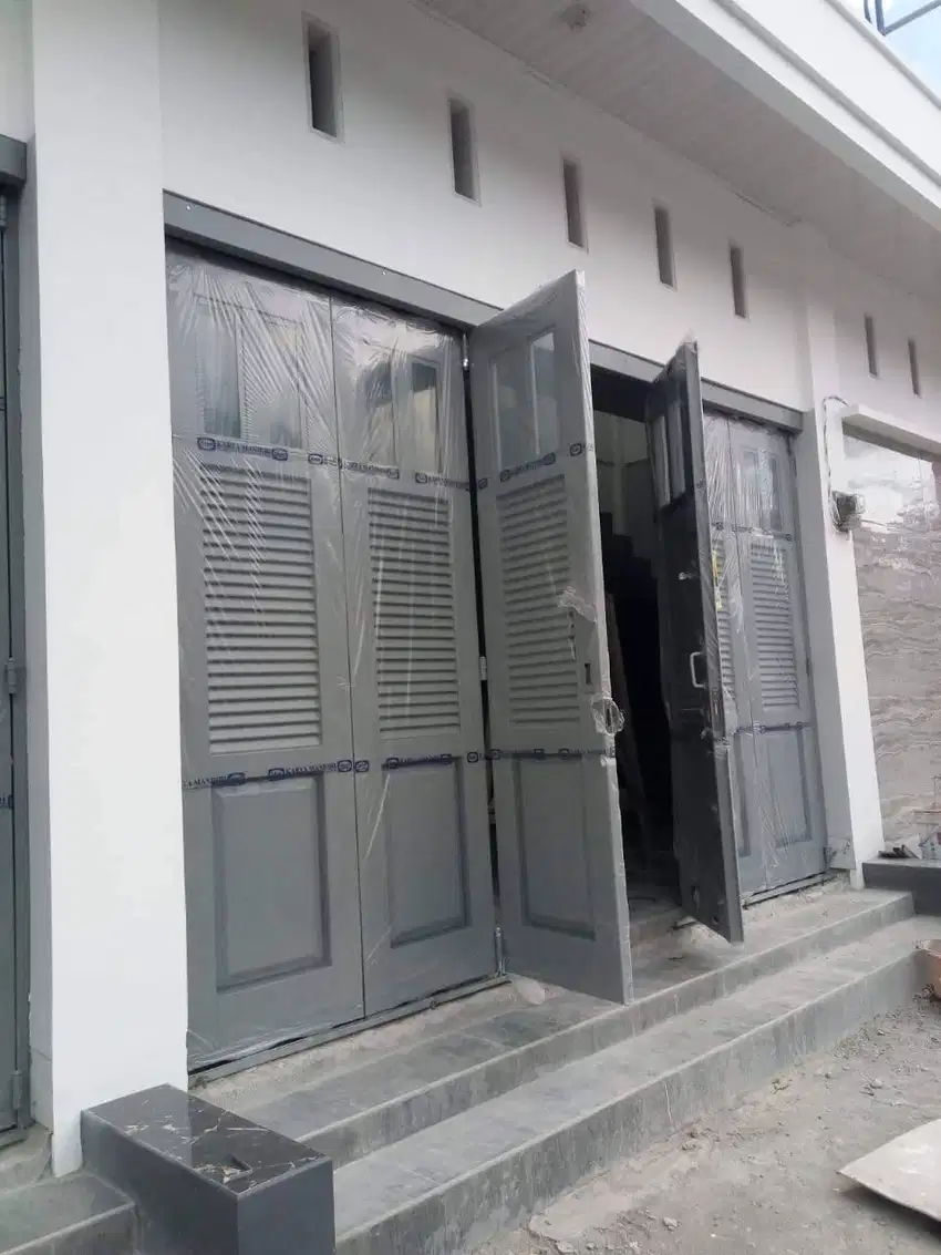 Pintu Garasi Lipat atau Sliding