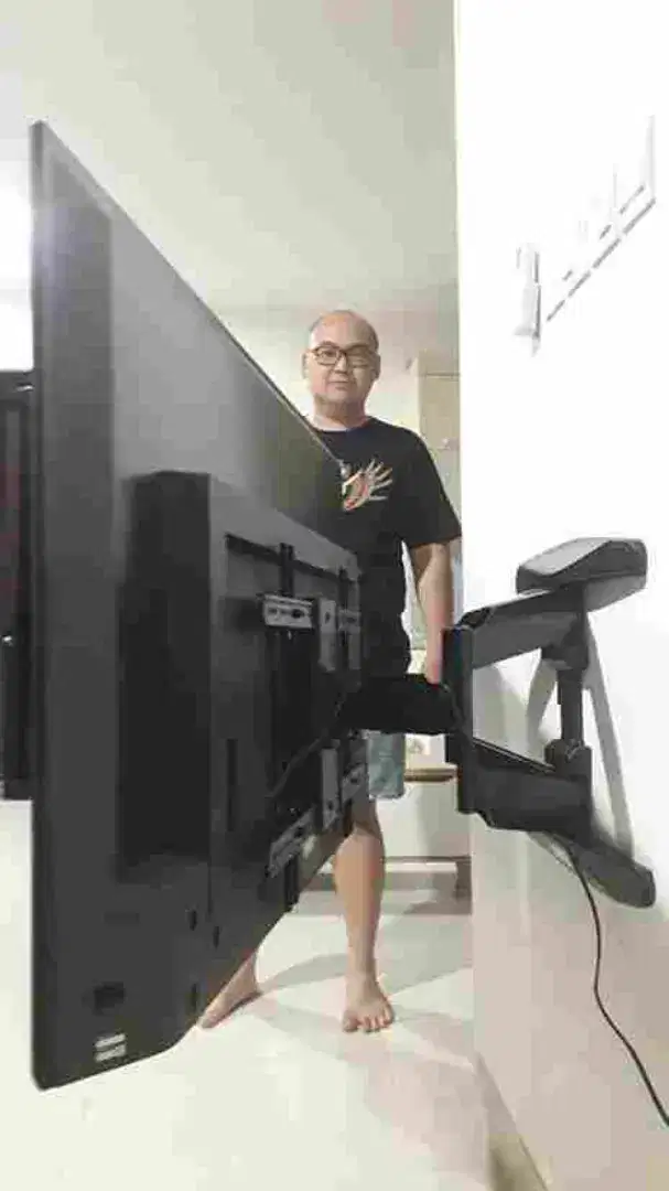 jual & pasang bracket swivel double arm utk gantungan tv led di tembok