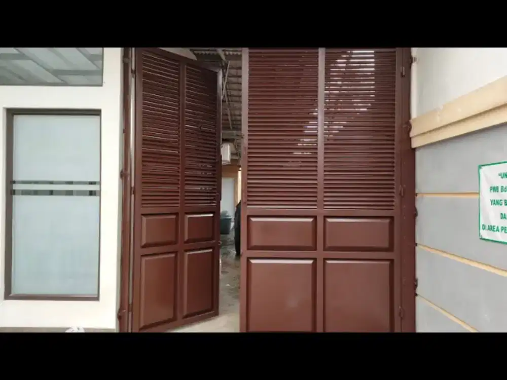 Pintu garasi lipat sleding