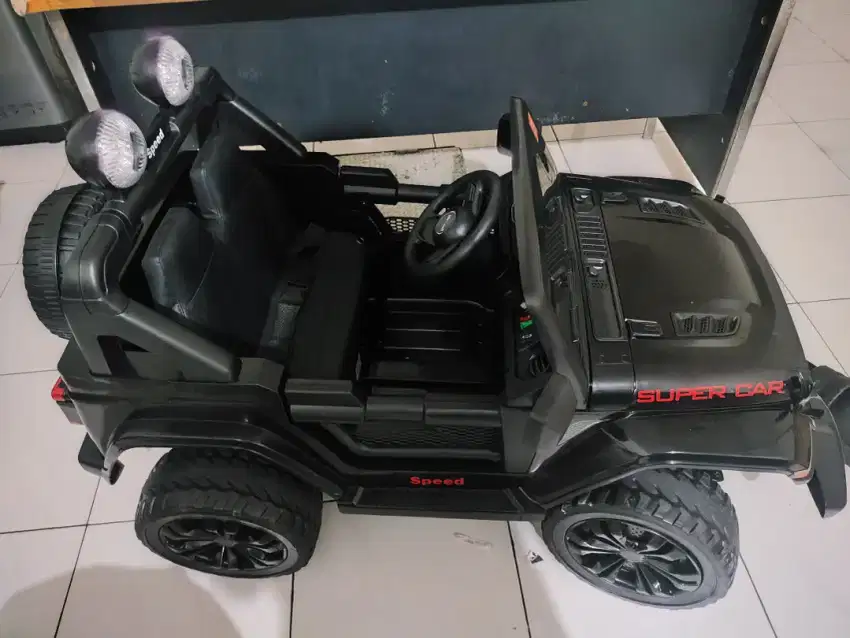 Mainan Anak Mobil Aki Unikid UK 871 Ban Karet Jok Kulit