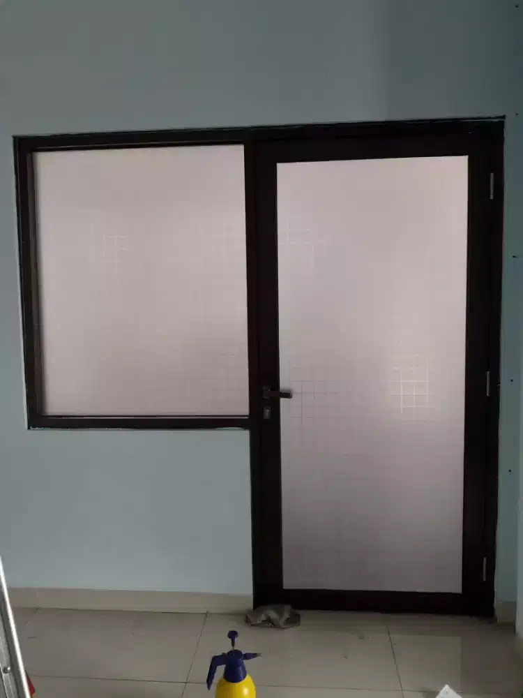 Jasa pasang kaca film gedung