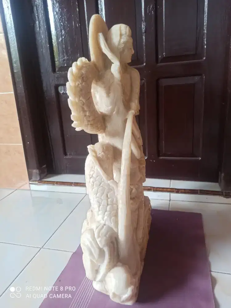 Kerajinan patung naga kuaim