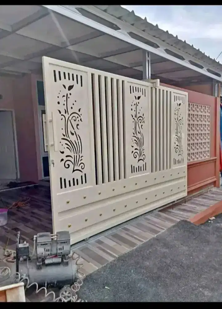 Pintu gerbang cating laser