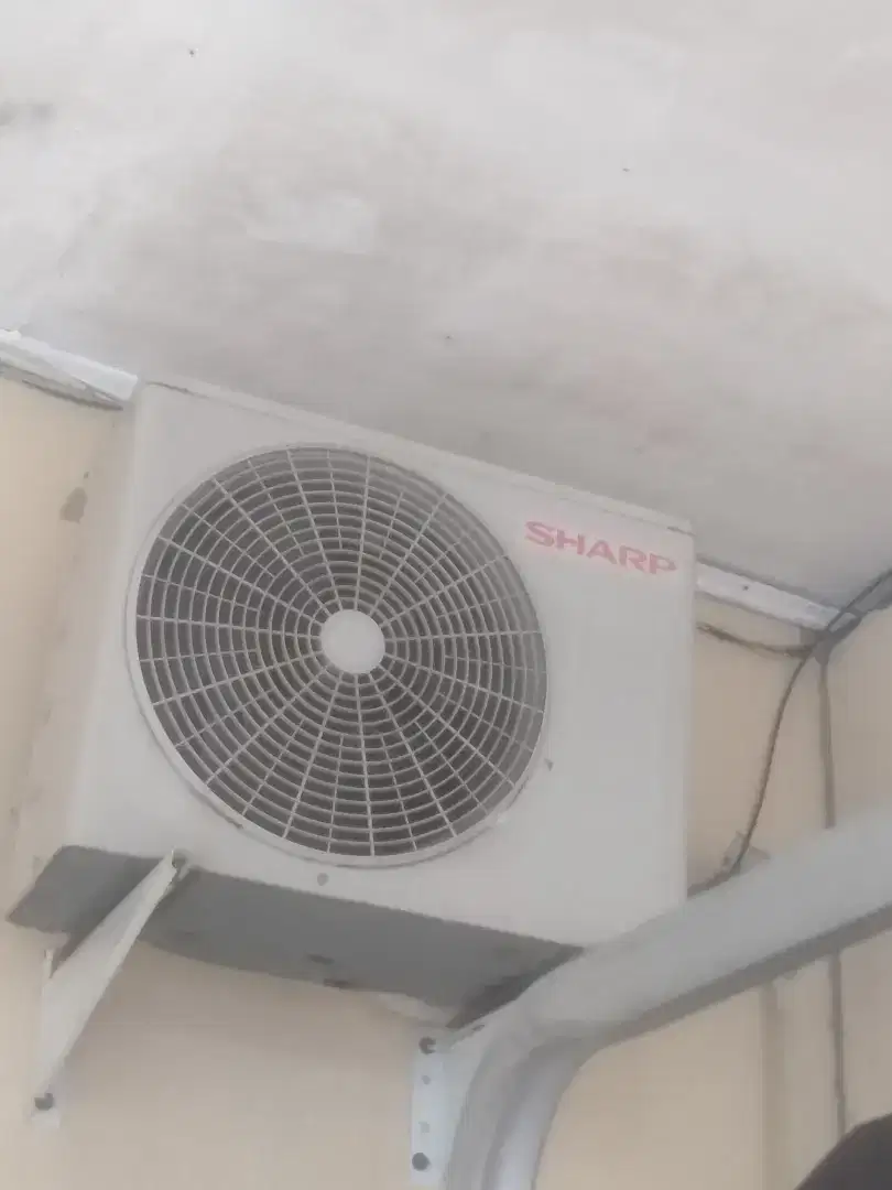 AC merk Sharp setengah pk