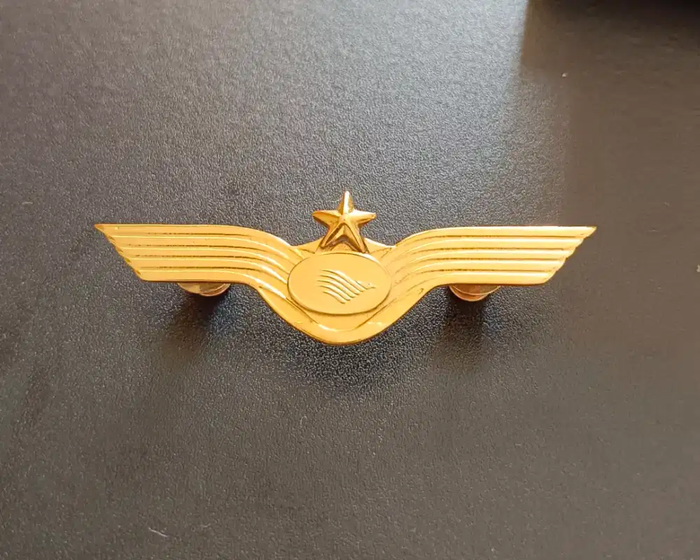 Flight attendant badge