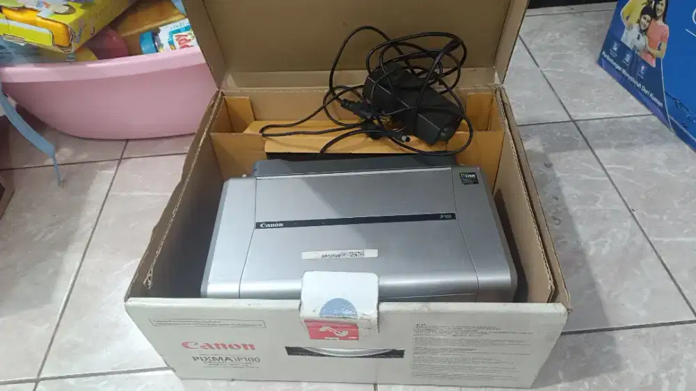 Printer portabel Canon IP100. Kondisi rusak