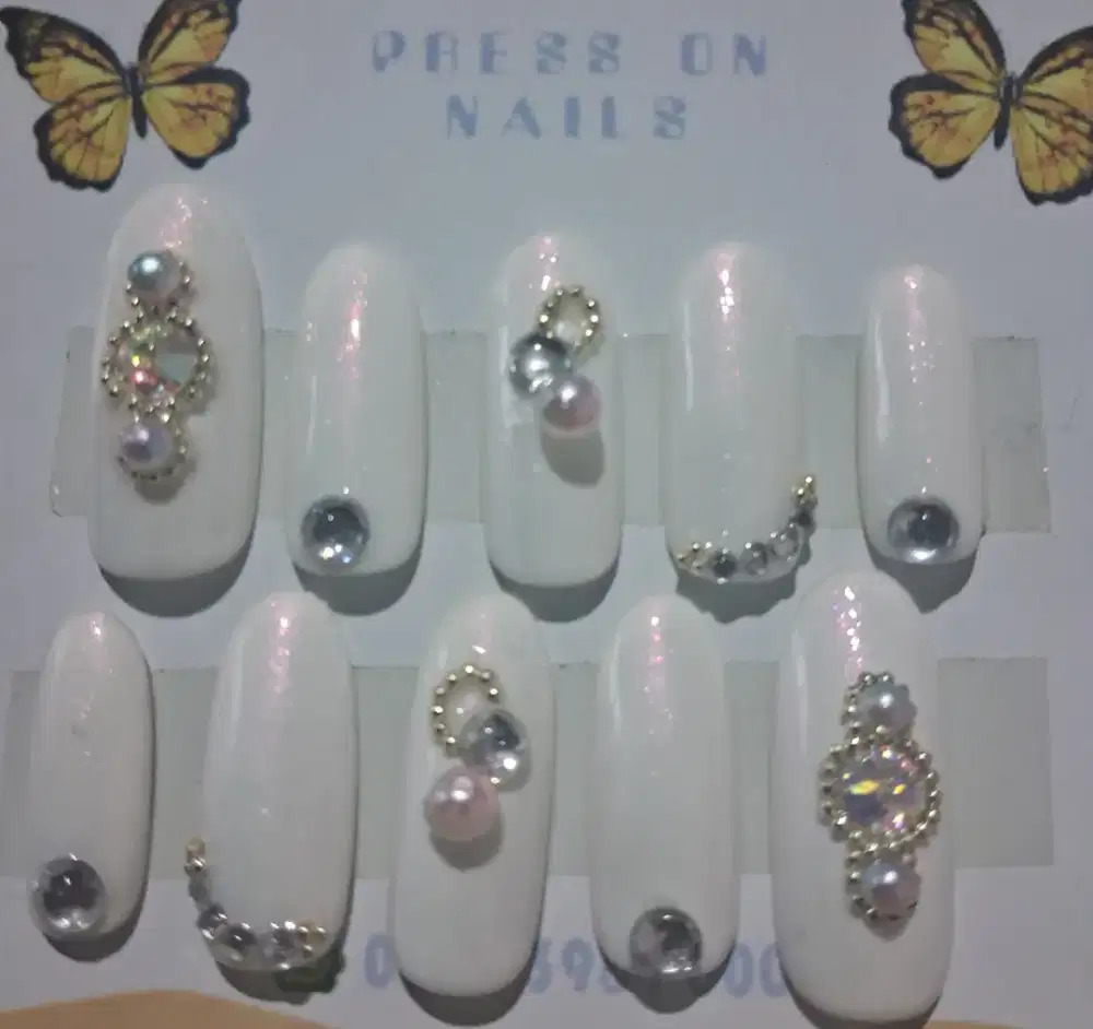 Nail tip include lem n kikir