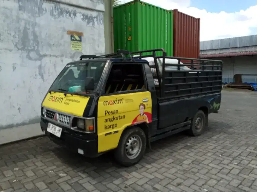 Sewa mobil pick up L300 mengangkut barang