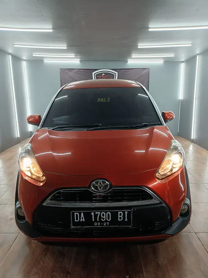 Toyota Sienta 1.5 G Manual tahun 2016, wrn oranye