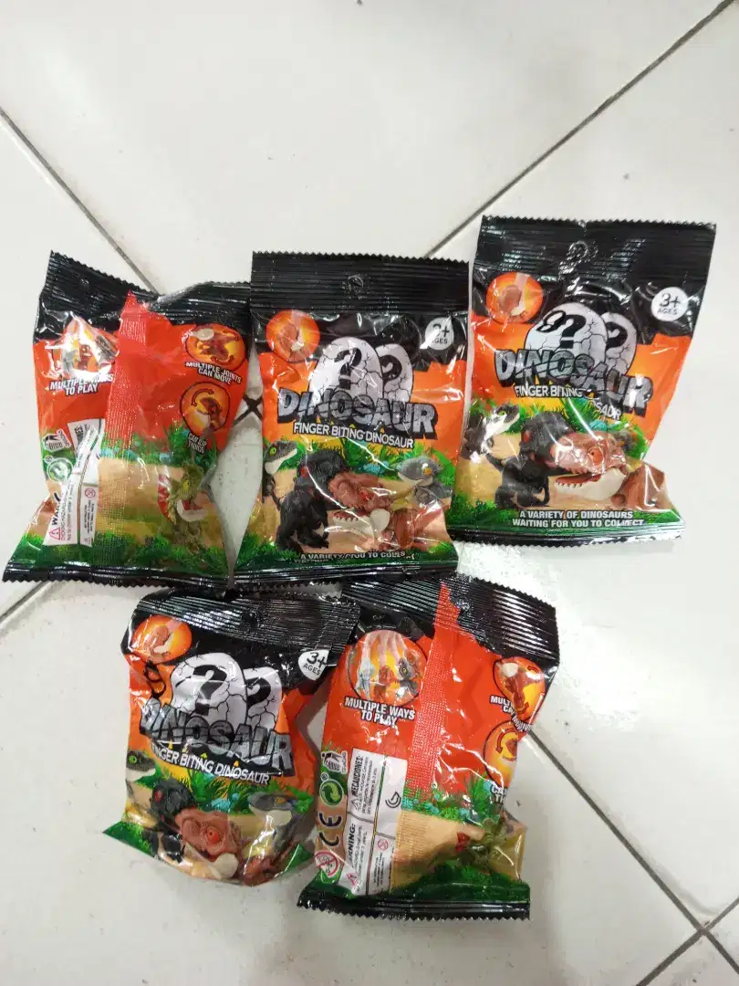 Mainan anak dino gigit random