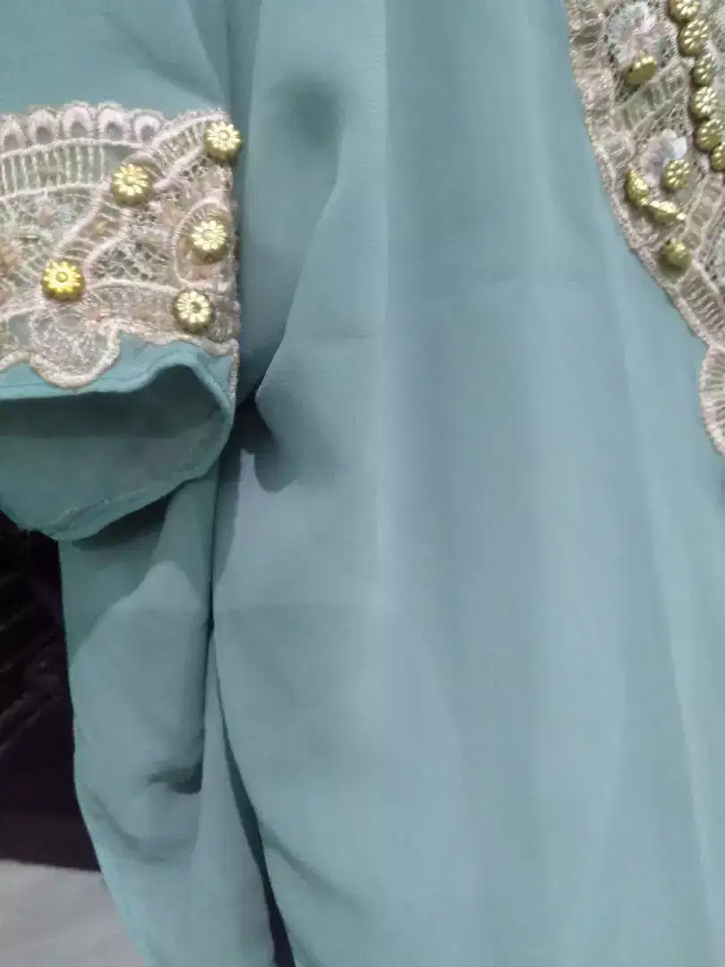 Baju kaftan bekas