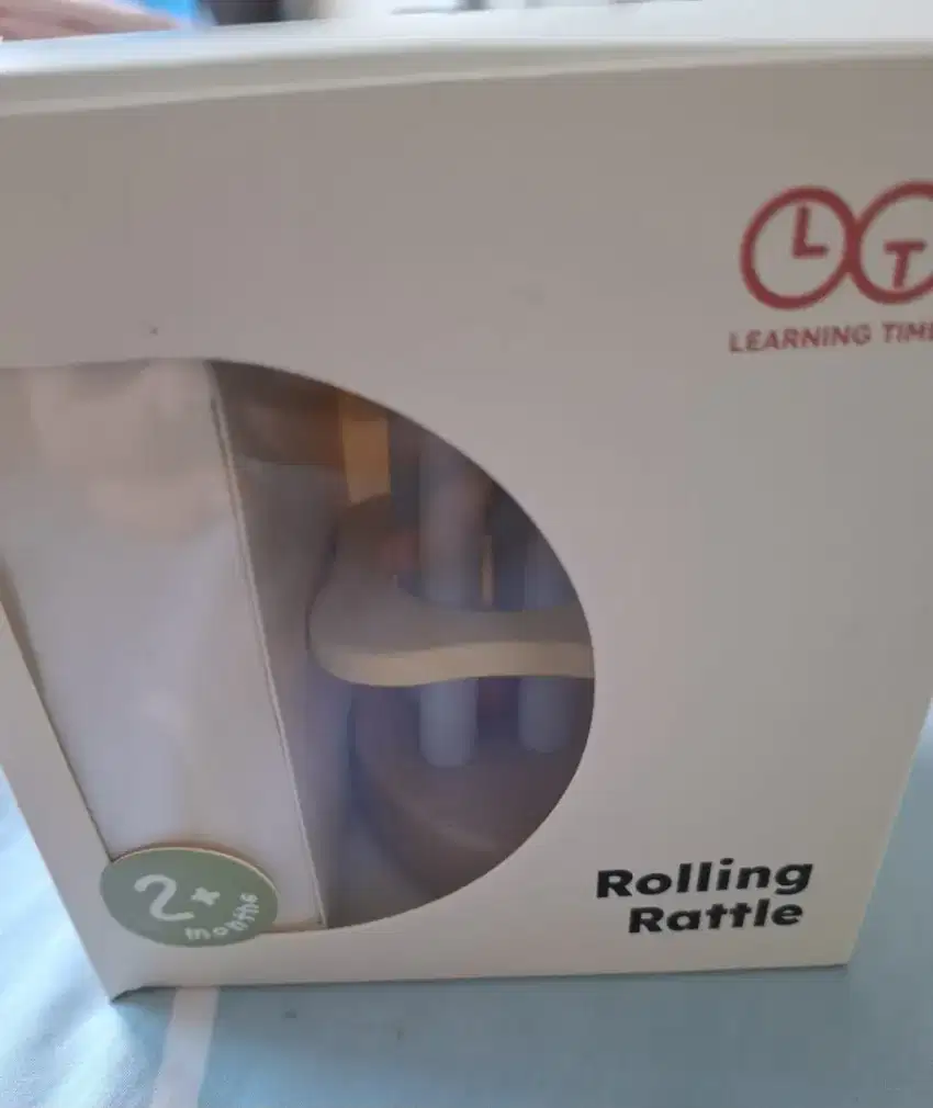 Rolling rattle mainan tummy time