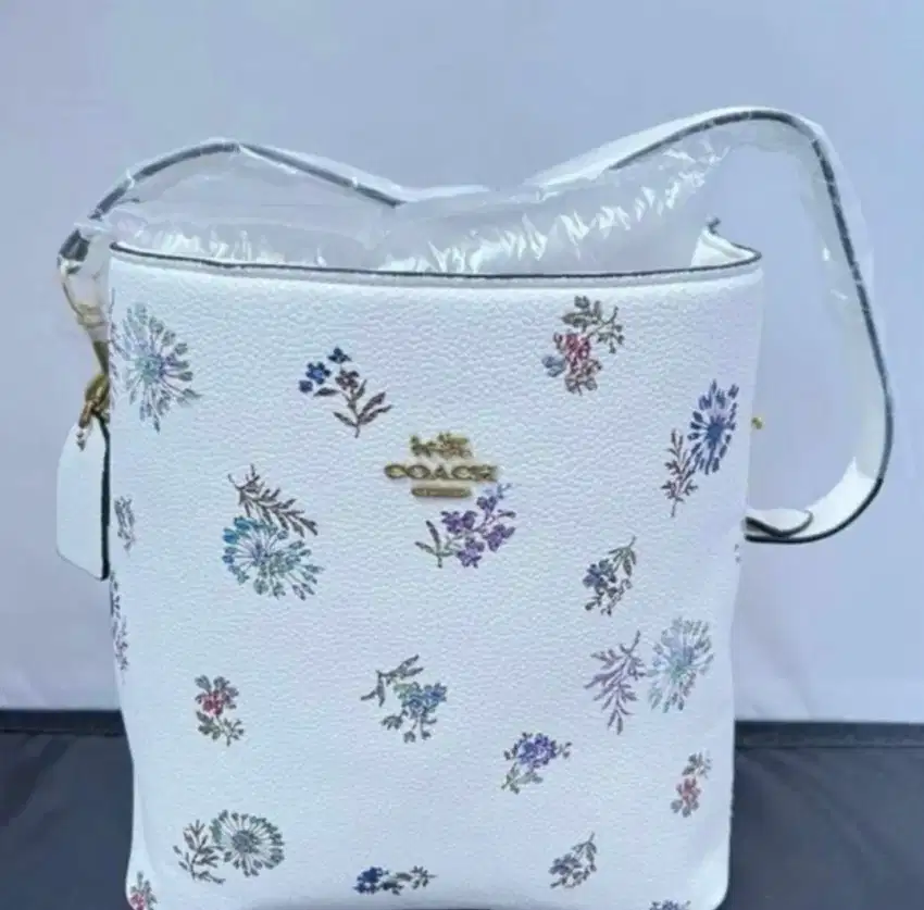 Tas coach bucket motif bunga