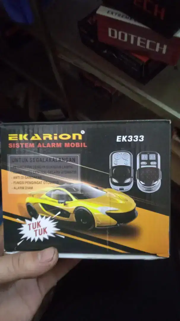 Alarm mobil merek ekarion plus pasang