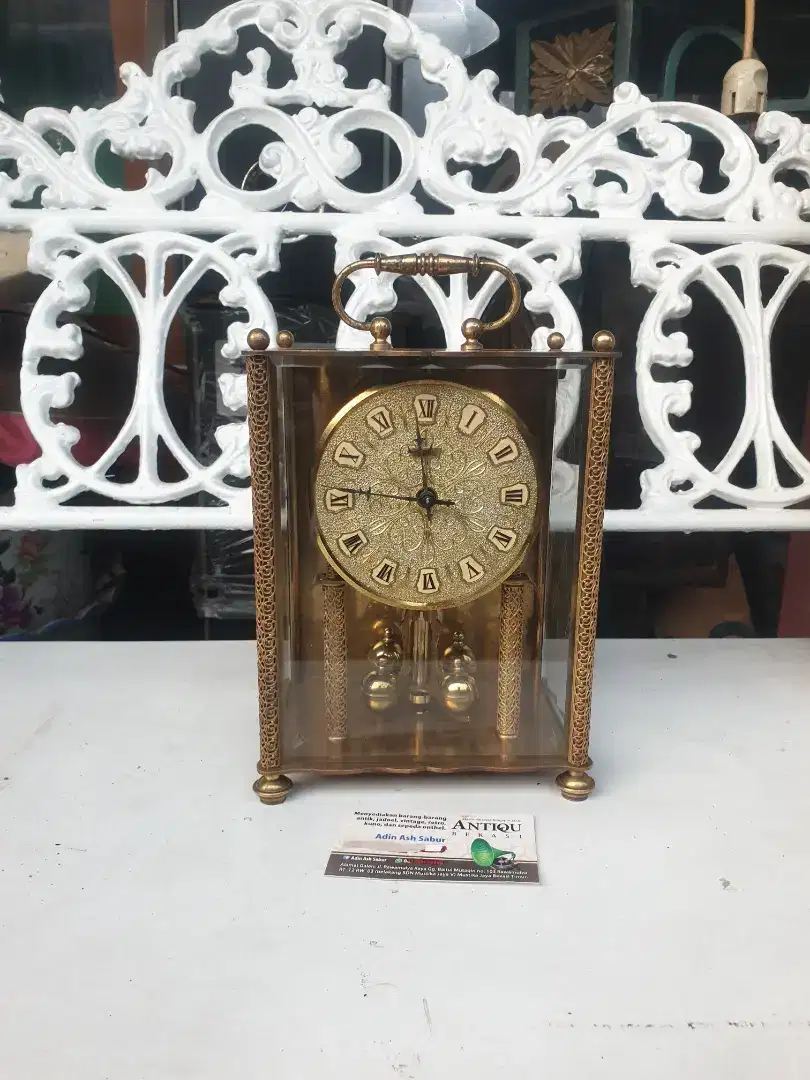 Vintage Comma commemorative clock from Germany made of gold plated