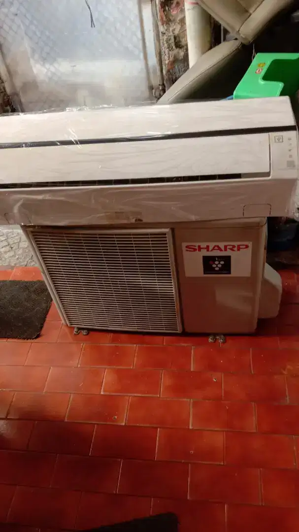 Ac Sharp  1pk +pasang garansi