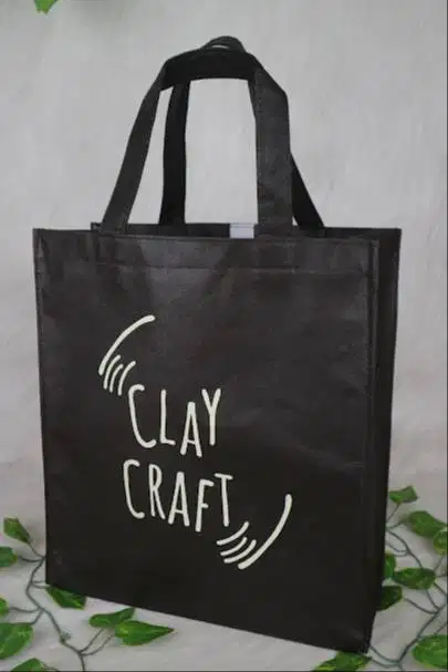 Penjahit Tas dan Helper Sablon
