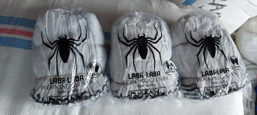 Sarung tangan benang laba laba