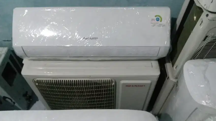 Ac sharp 1pk low watt second ori dingin bergaransi