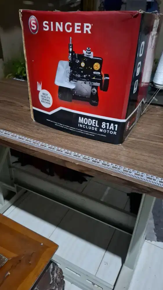 Mesin jahit obras singer