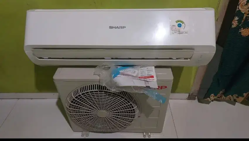 Ac sharp 1pk low watt second ori dingin bergaransi