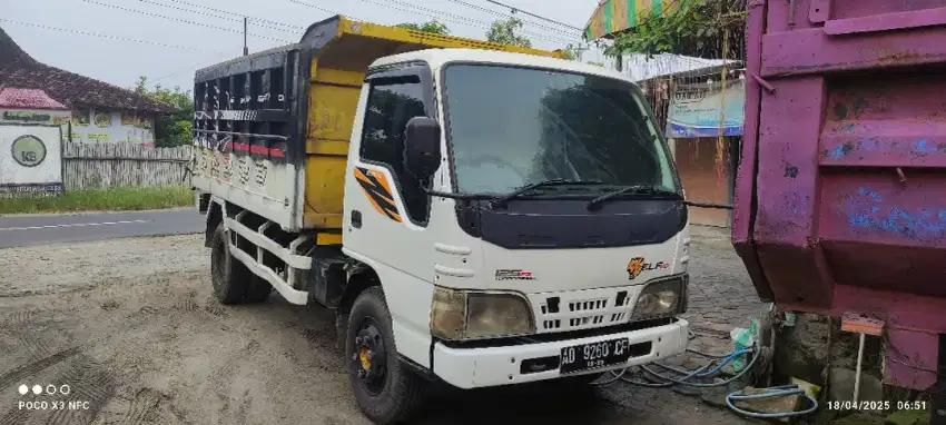 Elf dump truk 2023