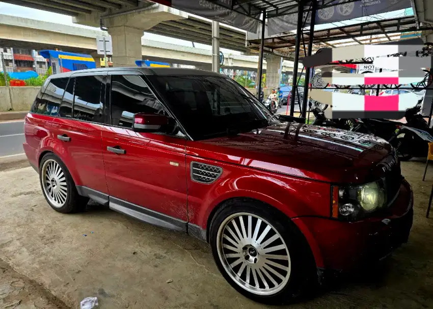 Range Rover Sport 4.2 V8 Supercharger Bensin AT Tahun 2009 Rimini Red