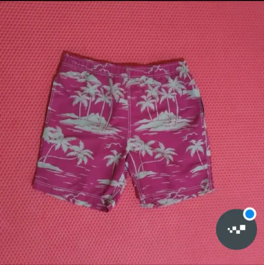 Celana pendek surfing merah floral