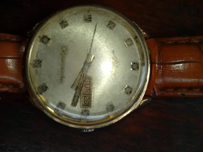 Jam emas merk antik