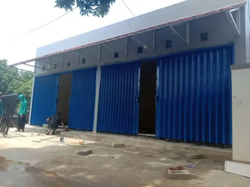 Rolling door folding gate