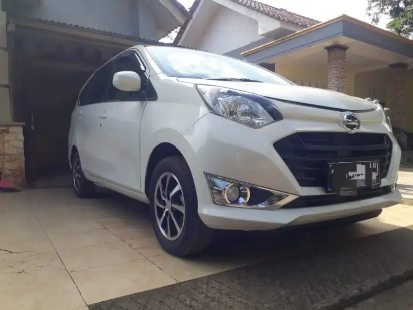Daihatsu Sigra MT 1.0  Putih tahun 2016.