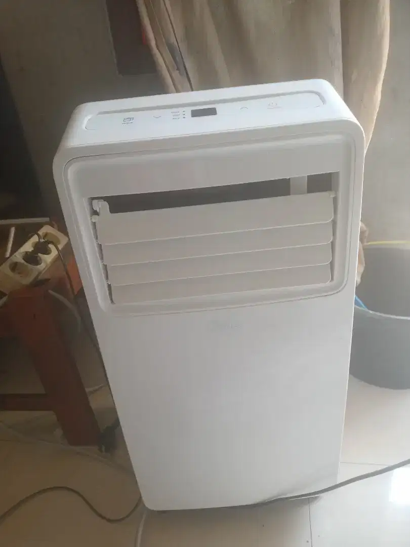Ac portable 1/2 pk Midea