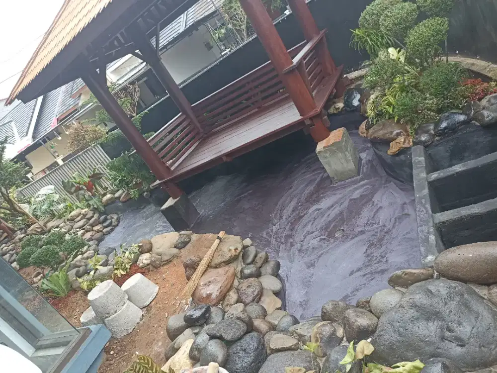 Jasa pembuatan kolam koi natural Batu alam
