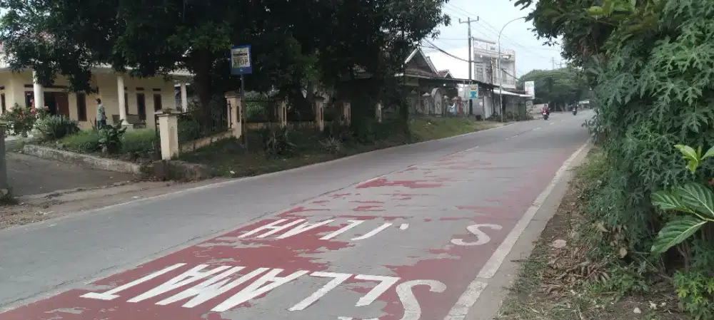 TANAH & BANGUNAN RUMAH PINGGIR JALAN