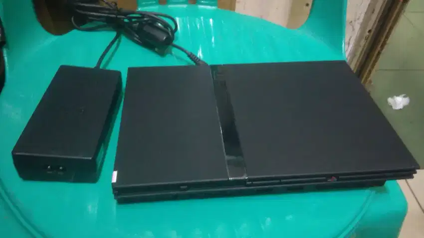 Jual PS2 slim s.70+adaptor+kabel power+kabel av+MC boot kondisi normal