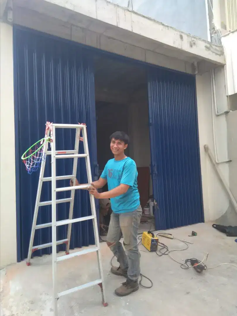 Folding gate pintu harmonika servis rolling door