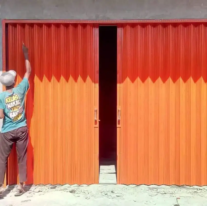 Rolling folding gate