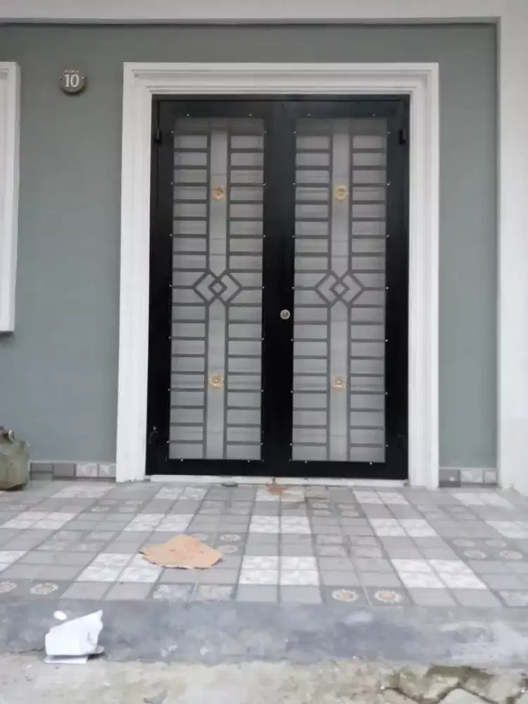 Pagar minimalis pintu garasi