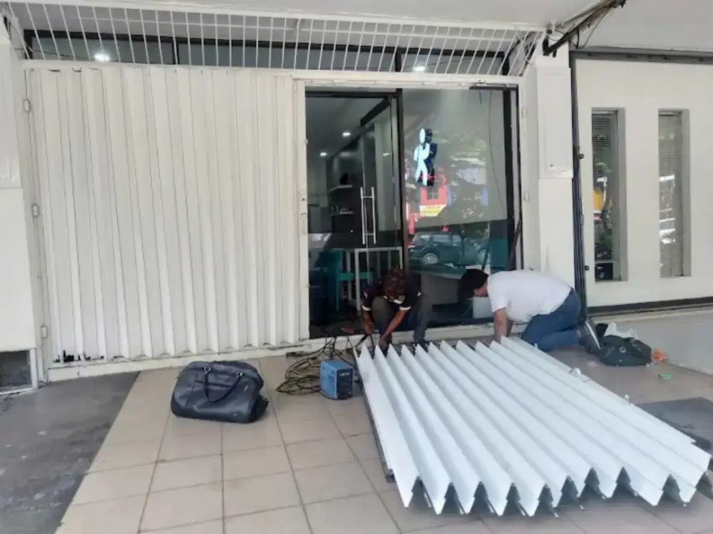 Tukang spesialis service rolling door folding gate murah