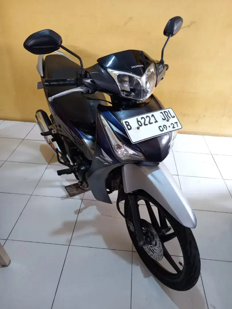 Supra x 2012 helm in masih mulus