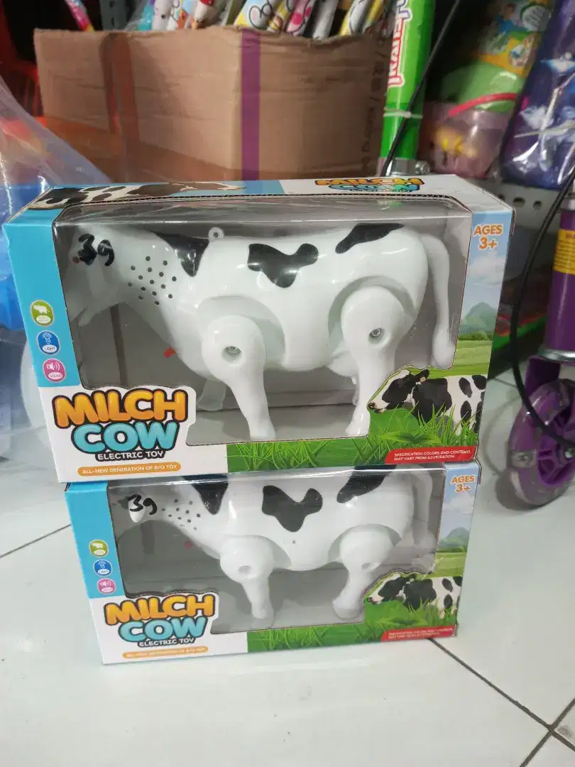 Mainan anak sapi baterai