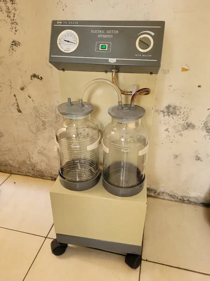 Mesin suction air medis . Mesin vakum medis