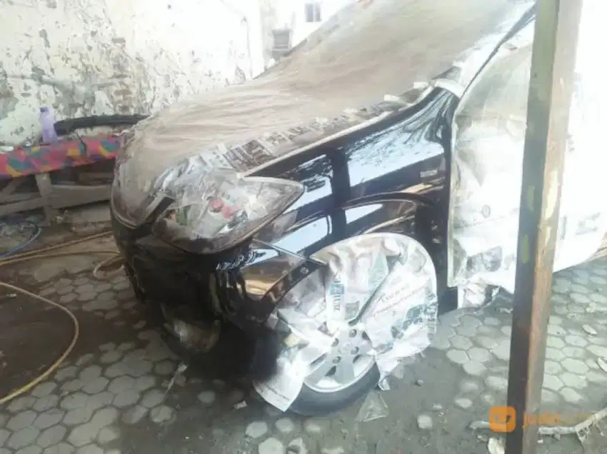 Body repair mobil dan motor