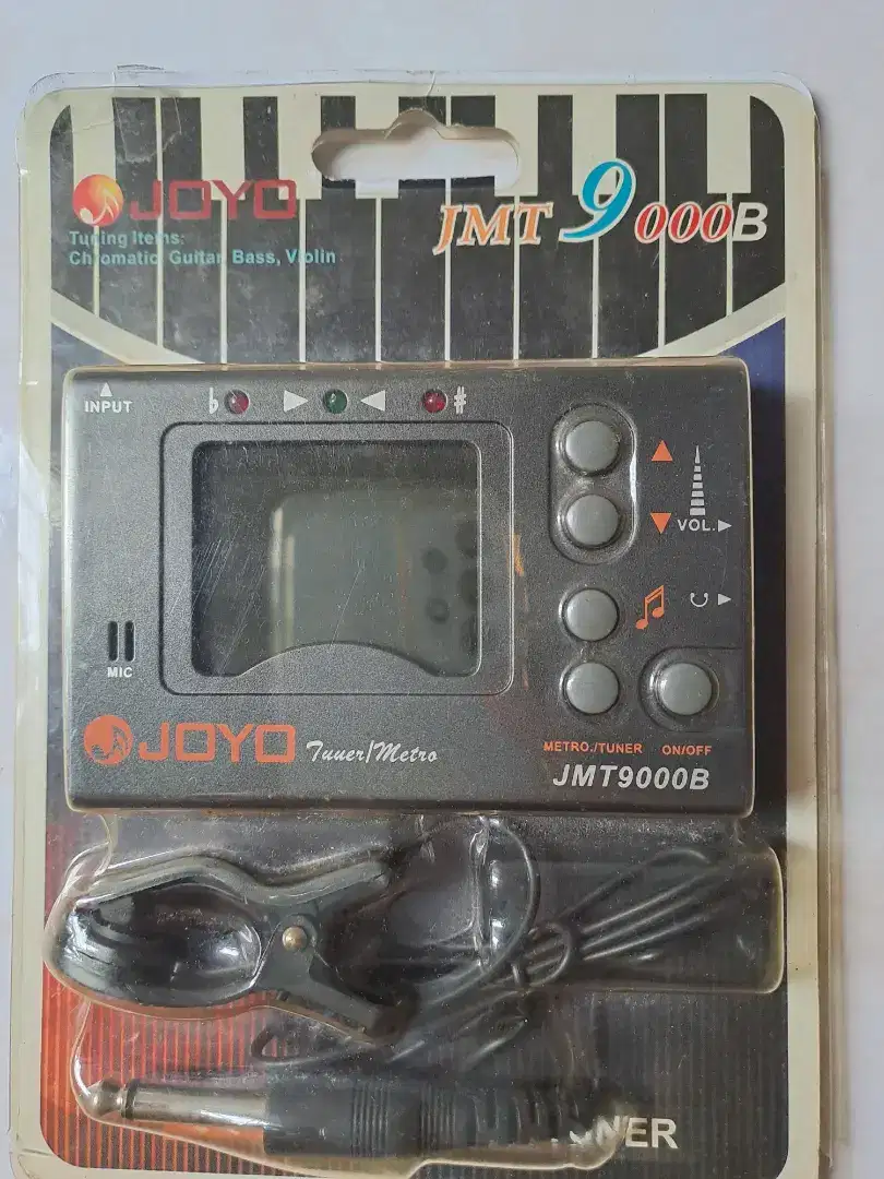 Tuner untuk gitar dan bass