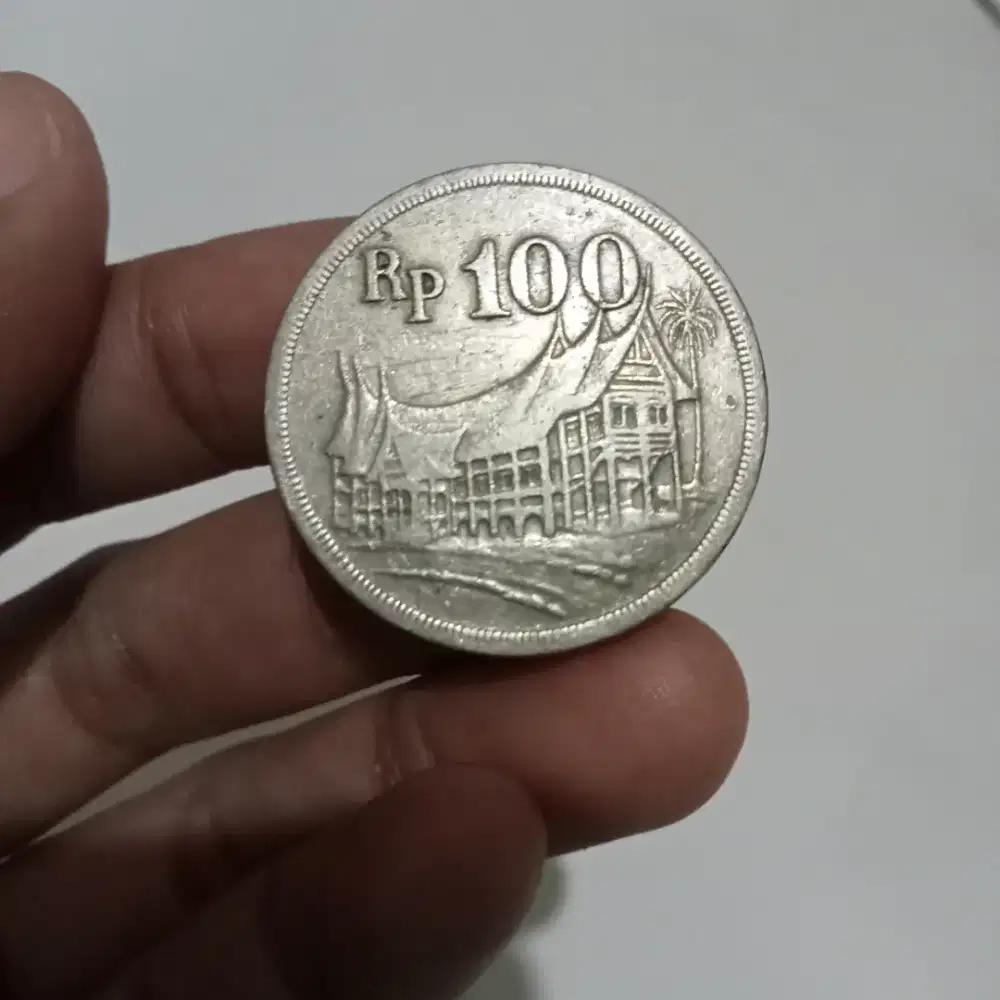 Koleksi Uang Koin Kuno Rp. 100 Tebal 1973 Rumah Gadang asli