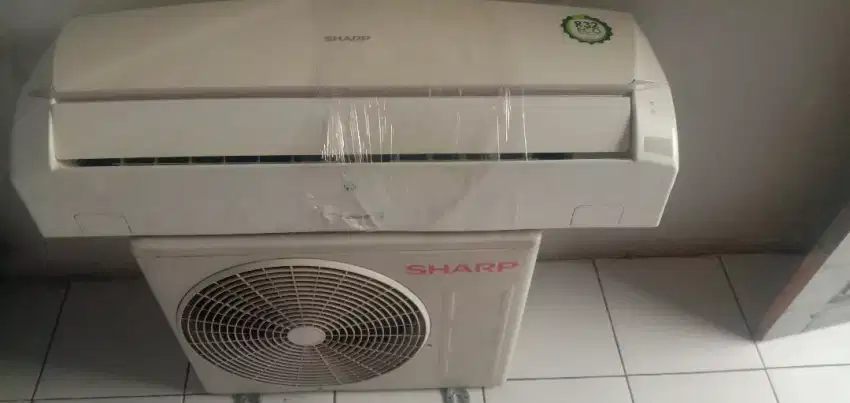 Di jual ac sharp setengah pk +pasang bergaransi