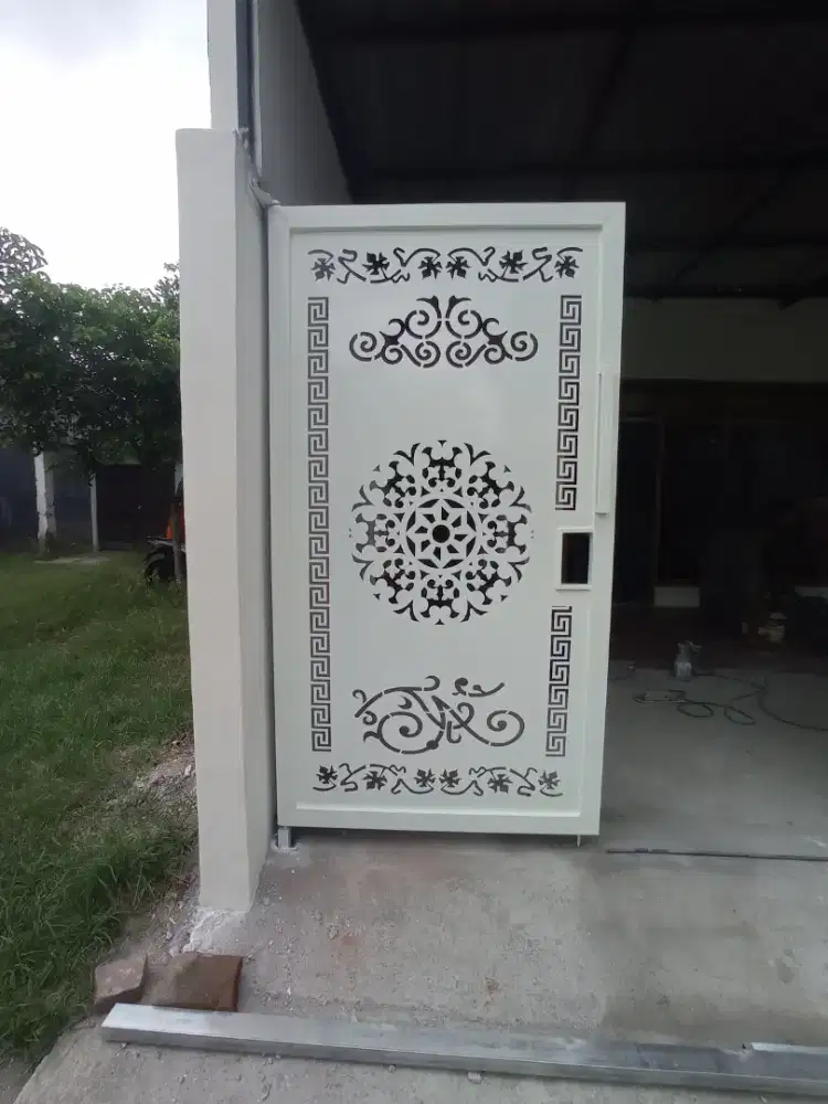 pintu pagar besi dg motif cuting plasma