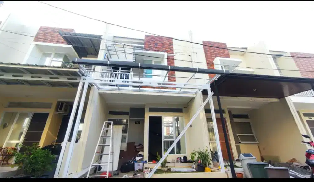 Pemasangan kanopi bajaringan spandek polos